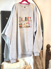 Load image into Gallery viewer, Cosy Bookshelf Sweater
