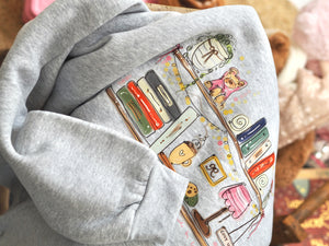 Cosy Bookshelf Sweater