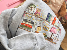Load image into Gallery viewer, Cosy Bookshelf Sweater
