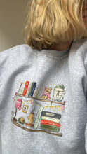 Load image into Gallery viewer, Cosy Bookshelf Sweater
